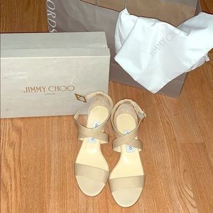 NWT Jimmy Choo Chiara patent nude sandals.  Comes with original box & dust bags.